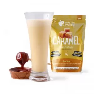 caramel diet protein shake in glass with sachet