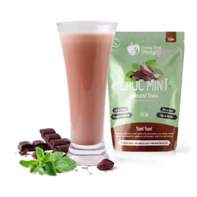 chocolate mint diet protein shake in glass with sachet