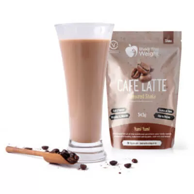 café latte diet protein shake in glass with sachet