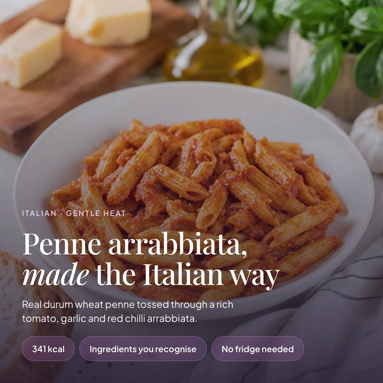 Bowl of EatProtein penne arrabbiata ready meal with durum wheat penne in a rich tomato, garlic and chilli sauce — 341 kcal, no fridge needed
