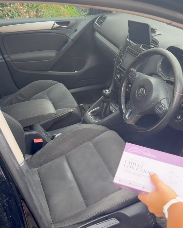 A ready meal being placed on a car seat