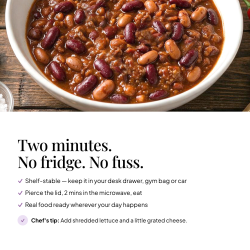 Bowl of Shake That Weight chilli con carne ready meal — shelf stable, pierce the lid and microwave for 2 minutes; chef's tip: add shredded lettuce and a little grated cheese