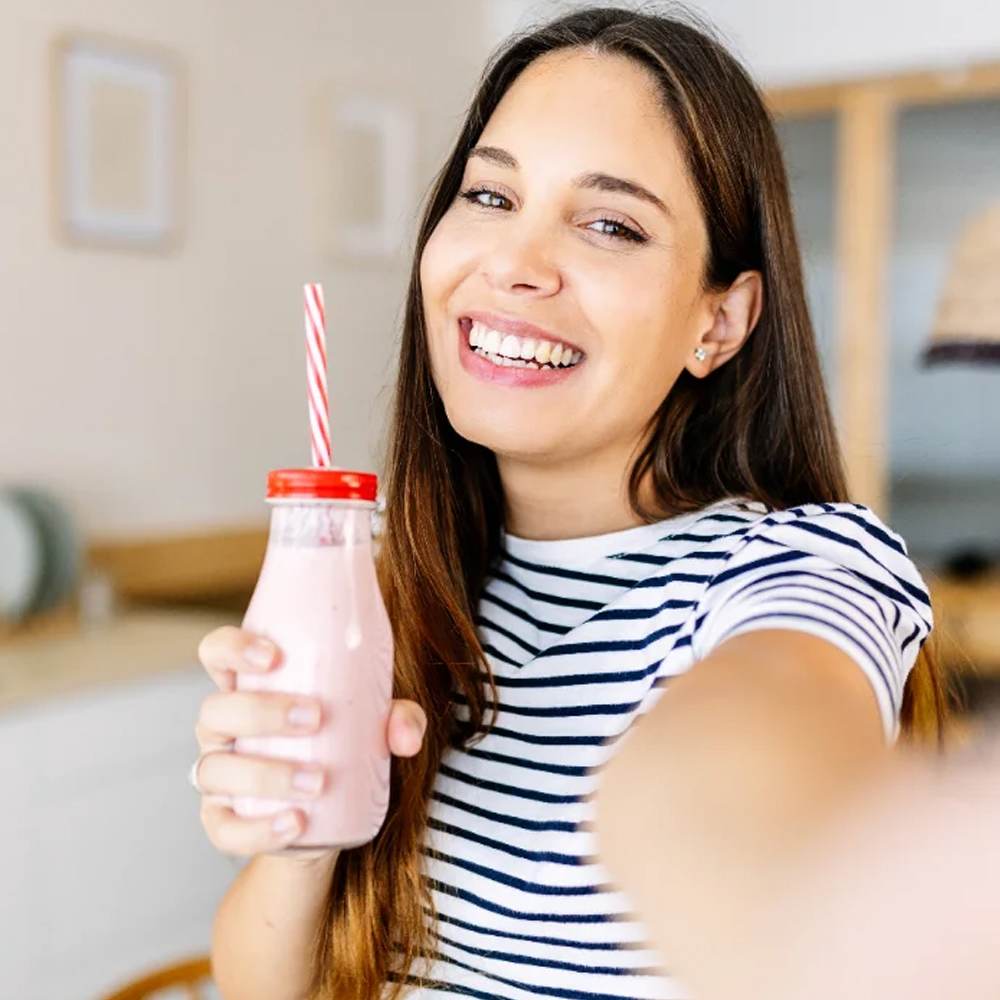 Smiling customer at home, ready to put a routine in place