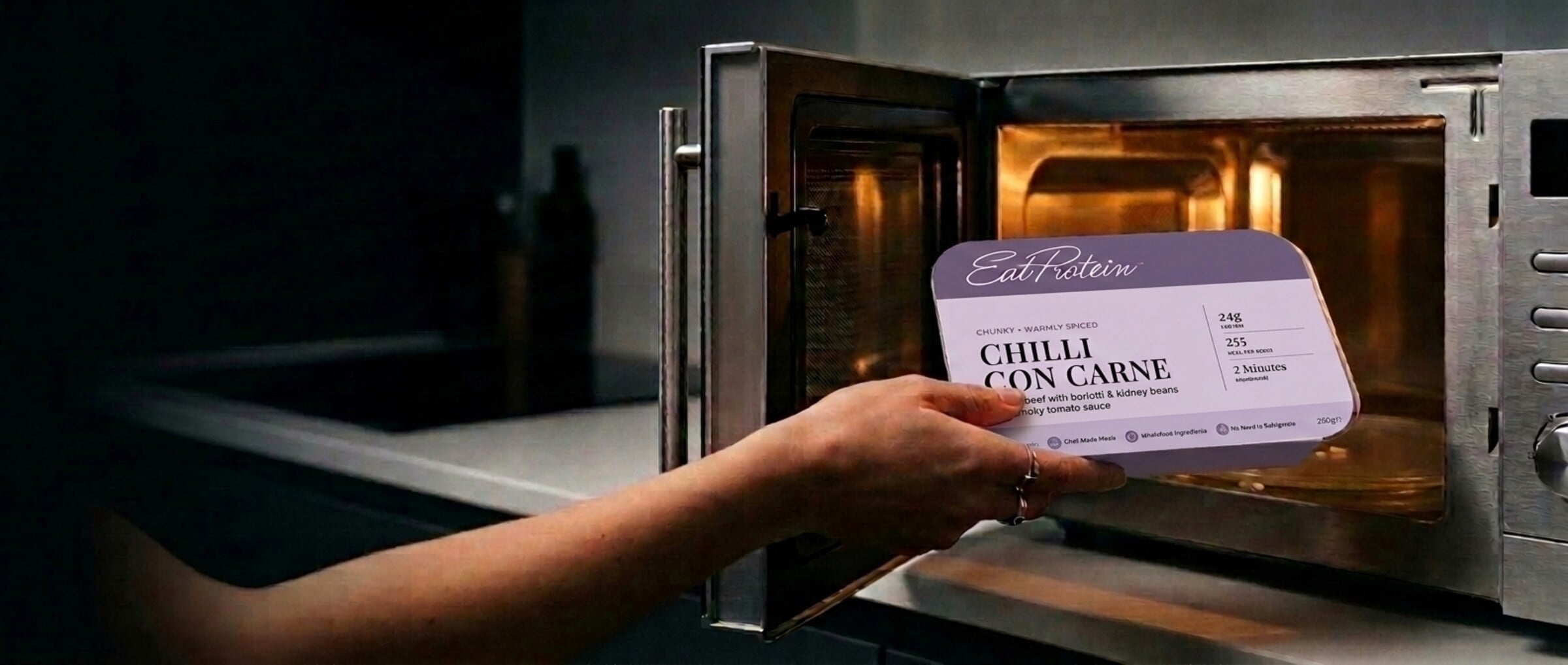 A chef-made ready meal going into the microwave, ready in two minutes
